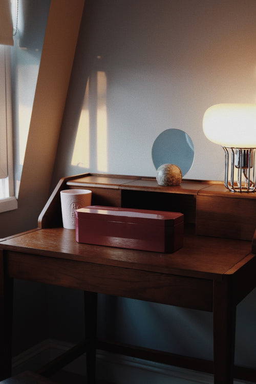 Vinidec octagonal glossy mulberry lacquered jewellery box, styled on a mid-century wooden vanity desk 